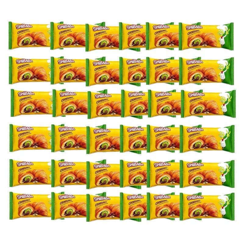 کروسان شیبابا با مغز کرم کاکائو و پسته وزن 55 گرمی(۳۶ عددی)